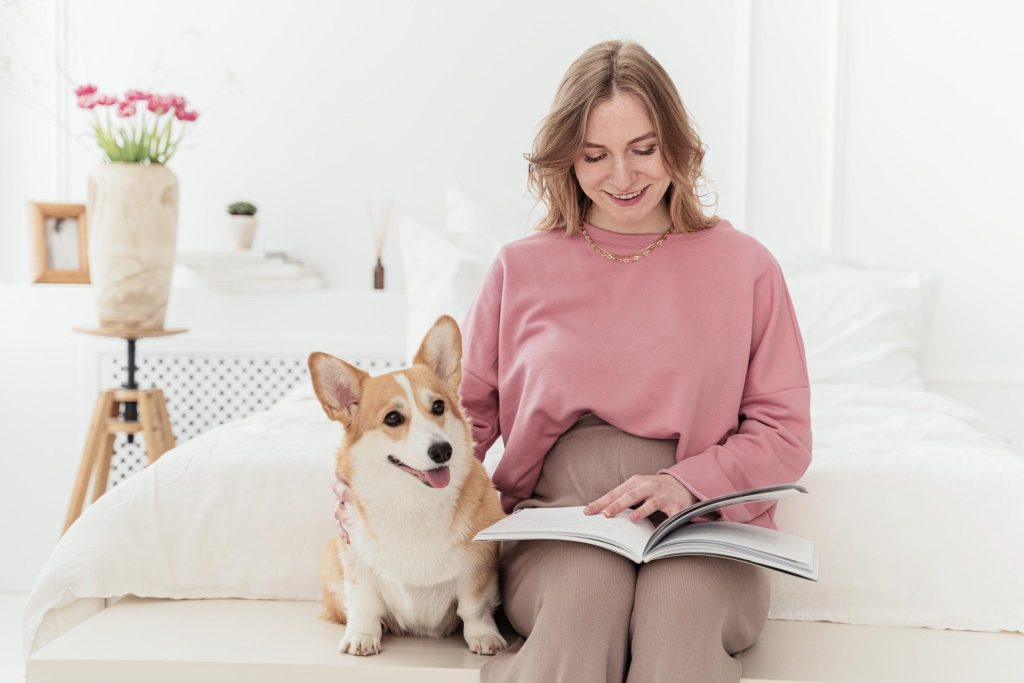 Lady reading with her dog