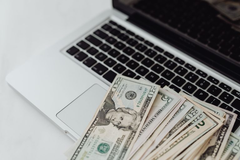 cash on a laptop